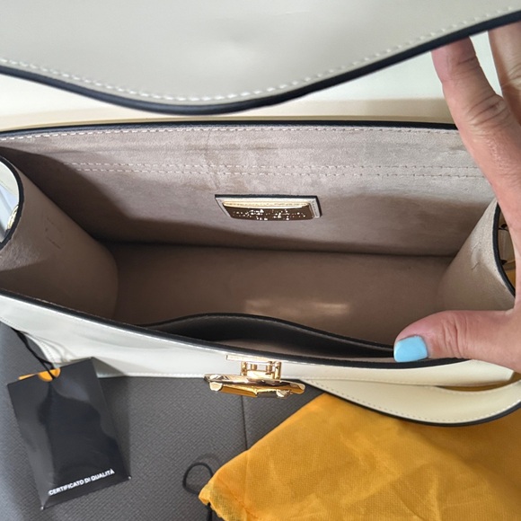 Mario Valentino Cream Satchel with Gold Emblem